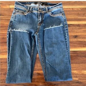 Jordache skinny jeans size 4 with embellished back pockets raw hem